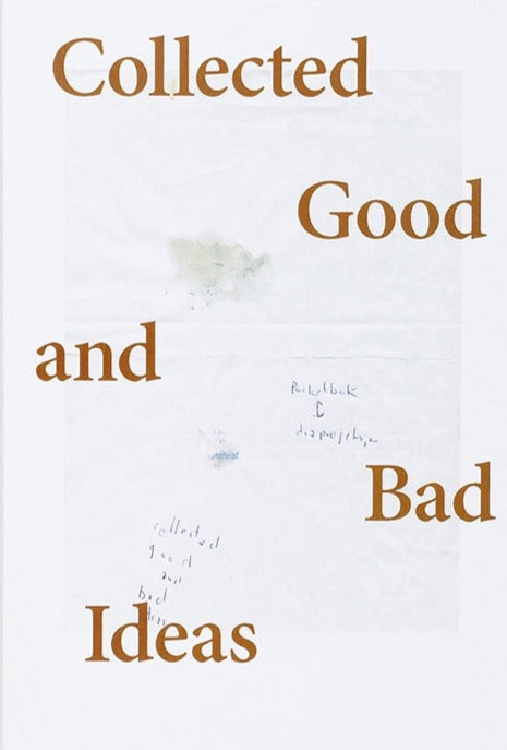 background is an image of a white folded paper with some notes taken with a blue pen. The title in serif brown font placed from top to bottom and elft to right taking the whole space