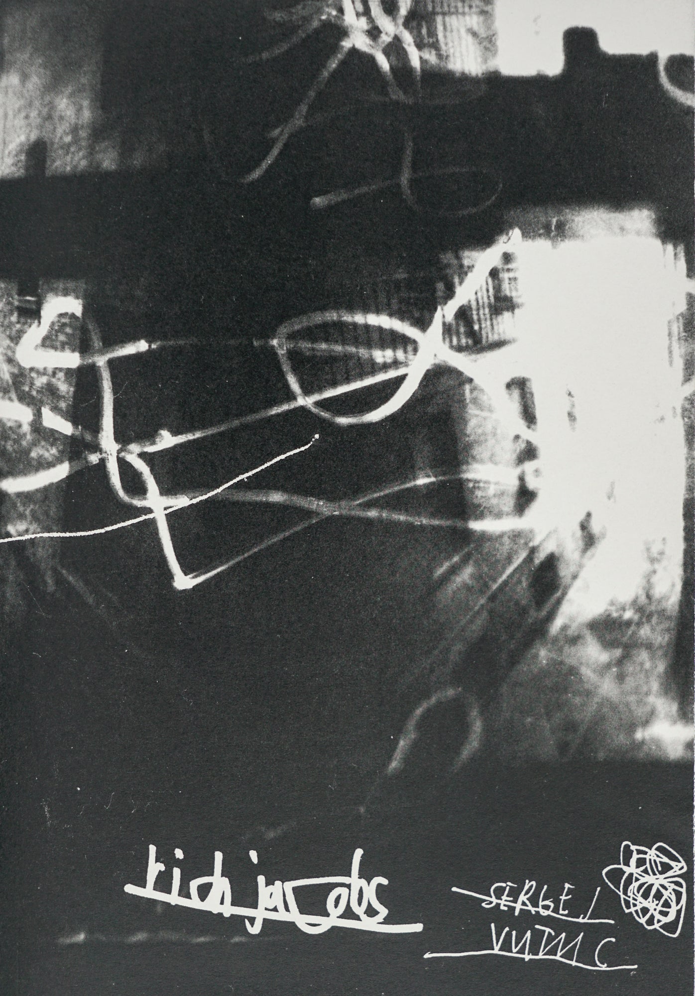 Book cover with an abstract field of black and white from a manipulated photograph. The authors names are at the bottom in handwriting: Sergej Vutuc and Rich Jacobs