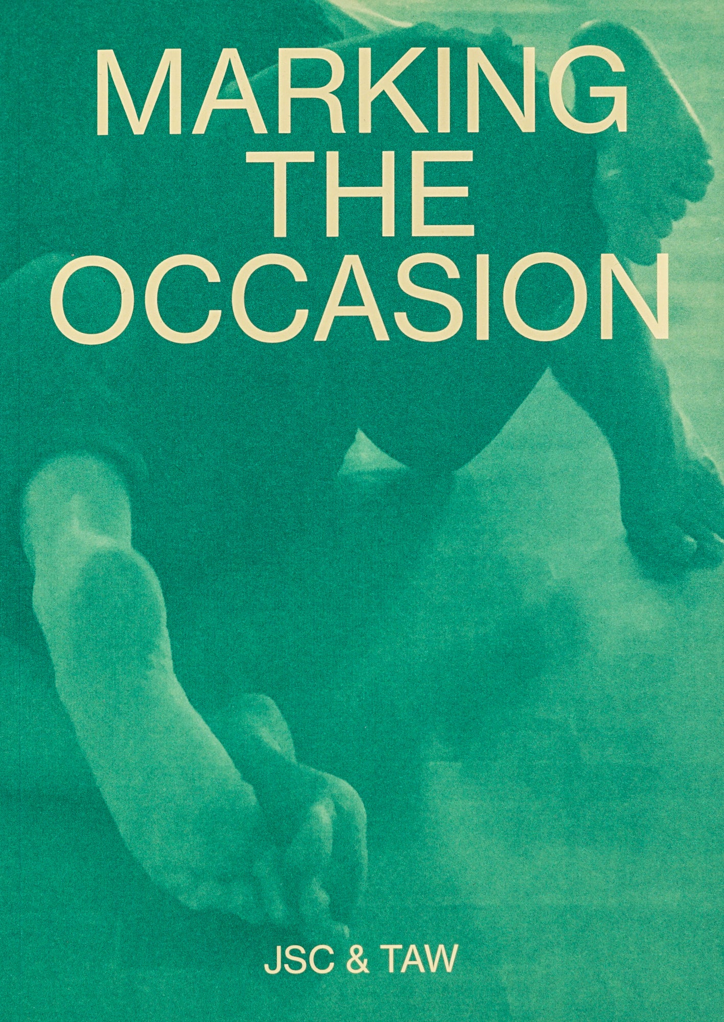 Cover, reading the title, 'MARKING THE OCCASION' in capital light yellow letters and sans serif type, centred on the top of the frame. The background is made up of a photograph of two entangled pairs of feet on what seems to be a dance floor.  The photograph is green, as if screen printed with a single colour.