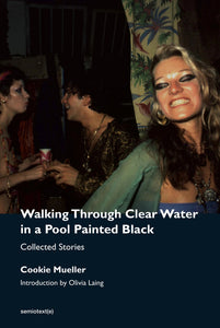 Walking Through Clear Water In a Pool Painted Black