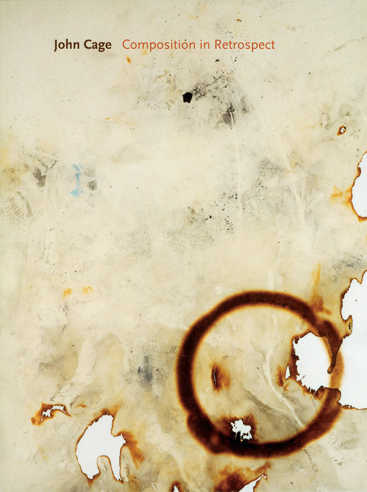 Burned paper backdrop with Composition in Retrospect by John Cage in sans serif text