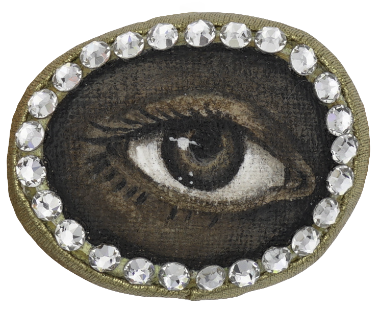 Hand painted eye plush ring with gem stone framing around the stitch-work. 